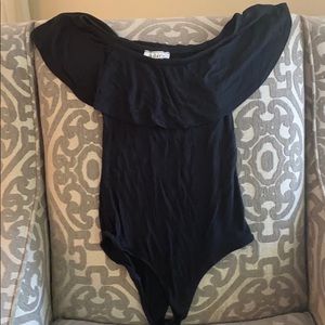 Black Off the shoulder bodysuit.